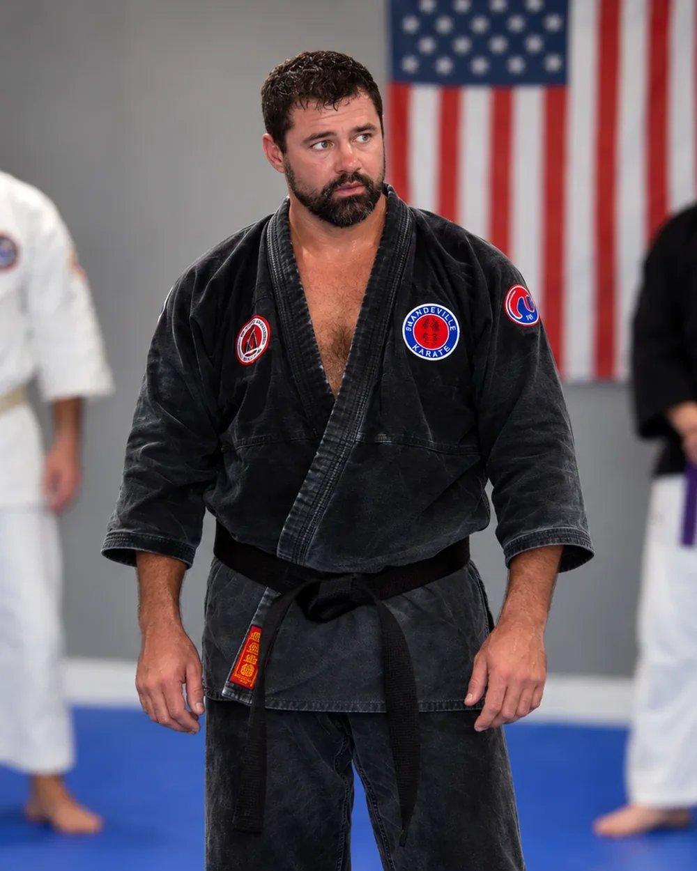 Chad Howell in a black gi and black belt